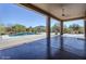 Covered patio with tile flooring shows a pool and views of desert landscaping and a mountain at 4772 E Agave Ln, Cave Creek, AZ 85331