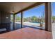 Large covered patio area provides a built-in grill, views of the pool and desert landscaping at 4772 E Agave Ln, Cave Creek, AZ 85331