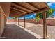 Covered patio and backyard featuring desert landscaping, and privacy walls at 5237 W Mountain View Rd, Glendale, AZ 85302