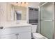 Bathroom featuring shower and toilet, vanity with a neutral color at 5237 W Mountain View Rd, Glendale, AZ 85302