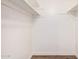Walk-in closet featuring shelving and wood-look flooring at 5237 W Mountain View Rd, Glendale, AZ 85302