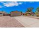 Welcoming single-story home featuring a two-car garage and desert landscaping at 5237 W Mountain View Rd, Glendale, AZ 85302