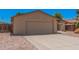 Single-story home features a two-car garage and easy-to-maintain rock landscaping at 5237 W Mountain View Rd, Glendale, AZ 85302
