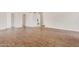 Open-concept living area with modern flooring and abundant natural light at 5237 W Mountain View Rd, Glendale, AZ 85302