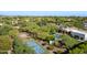Expansive aerial view showcasing the estate with its basketball court, pool, and well-manicured grounds at 6648 E Horseshoe Rd, Paradise Valley, AZ 85253