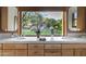 Bathroom vanity area featuring double sinks, stylish mirrors and a view of the yard at 6648 E Horseshoe Rd, Paradise Valley, AZ 85253