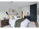 Cozy bedroom featuring a comfortable bed, built-in storage, and stylish decor at 6648 E Horseshoe Rd, Paradise Valley, AZ 85253