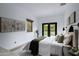 Bright bedroom featuring a comfortable bed, stylish decor, with a backyard view at 6648 E Horseshoe Rd, Paradise Valley, AZ 85253