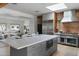 Bright and airy kitchen featuring a large island, stainless steel appliances, and an open layout at 6648 E Horseshoe Rd, Paradise Valley, AZ 85253