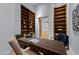 Spacious home office with custom built-ins, stylish desk and modern lighting at 6648 E Horseshoe Rd, Paradise Valley, AZ 85253