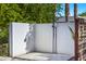 Private outdoor shower area with modern fixtures and a clean, minimalist design at 6648 E Horseshoe Rd, Paradise Valley, AZ 85253