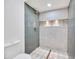 This bathroom features unique tiling and a rainfall shower head at 753 W Pampa Ave, Mesa, AZ 85210