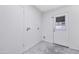 Clean laundry room featuring utility connections and direct backyard access at 753 W Pampa Ave, Mesa, AZ 85210
