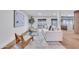 Stylish living room with hardwood floors, modern decor, and sliding doors to the backyard at 753 W Pampa Ave, Mesa, AZ 85210