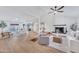 Bright and airy living room with hardwood floors, fireplace, and recessed lighting at 753 W Pampa Ave, Mesa, AZ 85210