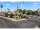 Inviting community entrance with lush landscaping and clear signage, offering a warm welcome to residents and visitors at 7565 N Vía De La Siesta --, Scottsdale, AZ 85258