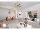 Bright, open-concept living room featuring modern furnishings and plenty of natural light at 7565 N Vía De La Siesta --, Scottsdale, AZ 85258
