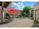 Charming brick patio with outdoor seating and lush landscaping, creating a serene and inviting outdoor space at 7565 N Vía De La Siesta --, Scottsdale, AZ 85258