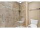 Shower features glass doors and tile surround at 7835 E Glenrosa Ave # 13, Scottsdale, AZ 85251