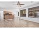 Open floor plan showing living room, dining area, and the kitchen with breakfast bar at 8037 W Mohave St, Phoenix, AZ 85043