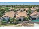 This overhead shows residential homes in a golf course community with mature landscaping and pools at 8136 E Cortez Dr, Scottsdale, AZ 85260