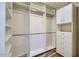 Large walk-in closet with custom shelving and storage at 8136 E Cortez Dr, Scottsdale, AZ 85260