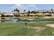 Picturesque golf course community with views of a lake and manicured green spaces at 8136 E Cortez Dr, Scottsdale, AZ 85260