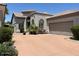 Stunning single-Gathering home with a three car garage, and well-manicured landscaping at 8136 E Cortez Dr, Scottsdale, AZ 85260