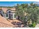 Inviting home featuring desert landscaping, a private drive, and beautiful architectural details at 8136 E Cortez Dr, Scottsdale, AZ 85260