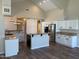 Bright kitchen boasts stainless steel appliances, granite countertops, and center island at 8136 E Cortez Dr, Scottsdale, AZ 85260