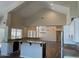 Modern kitchen boasts stainless steel appliances, granite countertops, and large island at 8136 E Cortez Dr, Scottsdale, AZ 85260