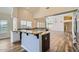 Bright and open kitchen with granite countertops and seamless connection to the living area at 8136 E Cortez Dr, Scottsdale, AZ 85260