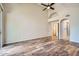 Bright living room features wood floors, high ceilings, and multiple doors at 8136 E Cortez Dr, Scottsdale, AZ 85260