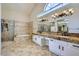 Luxury bathroom with dual vanities, soaking tub, and tiled walk-in shower at 8136 E Cortez Dr, Scottsdale, AZ 85260