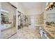 Luxury bathroom with dual vanities, soaking tub, and tiled walk-in shower at 8136 E Cortez Dr, Scottsdale, AZ 85260