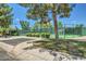 View of the community tennis court with well-maintained landscape at 8136 E Cortez Dr, Scottsdale, AZ 85260