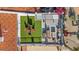 Aerial shot of rooftop deck with artificial turf and a separate seating area at 8514 E Country Club Trl, Scottsdale, AZ 85255
