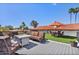 Inviting rooftop patio with comfortable seating, fire pit, artificial turf, and stunning views at 8514 E Country Club Trl, Scottsdale, AZ 85255