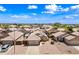 Beautiful neighborhood aerial view showcasing well-maintained homes with desert landscaping and tile roofs at 8657 E Capri Ave, Mesa, AZ 85208