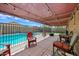 Inviting backyard with a covered patio and refreshing pool, ideal for summer gatherings at 8657 E Capri Ave, Mesa, AZ 85208