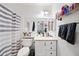 Bathroom with neutral colors, a vanity, and shower at 8657 E Capri Ave, Mesa, AZ 85208