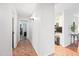 Hallway showcasing tile floor and neutral paint at 8657 E Capri Ave, Mesa, AZ 85208