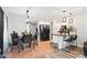 Stylish eat-in kitchen with stainless steel appliances and a breakfast bar area at 8657 E Capri Ave, Mesa, AZ 85208