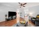 Inviting living room featuring modern decor, ceiling fan, and stylish furnishings at 8657 E Capri Ave, Mesa, AZ 85208