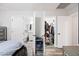 Main bedroom featuring an en-suite bathroom and walk-in closet for ample storage at 8657 E Capri Ave, Mesa, AZ 85208
