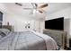 Main bedroom featuring an en-suite bathroom and walk-in closet at 8657 E Capri Ave, Mesa, AZ 85208