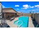 Relaxing backyard pool with ample lounge space, perfect for enjoying the sun at 8657 E Capri Ave, Mesa, AZ 85208