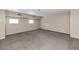 Spacious basement featuring neutral walls, carpeted flooring, and recessed lighting at 9026 W Cambridge Ave, Phoenix, AZ 85037