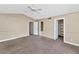 Cozy bedroom with ceiling fan and easy access to nearby bathrooms at 9026 W Cambridge Ave, Phoenix, AZ 85037