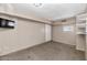 Clean room featuring neutral paint, carpeting and an exit door at 9026 W Cambridge Ave, Phoenix, AZ 85037